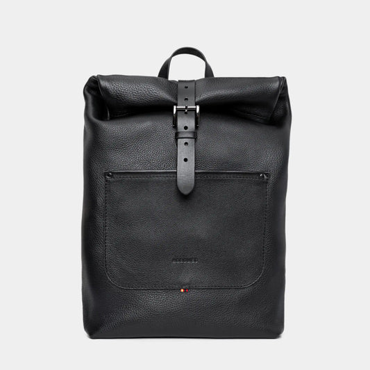 Nordweg Legacy leather backpack in coal, front view with roll-top and metal buckle