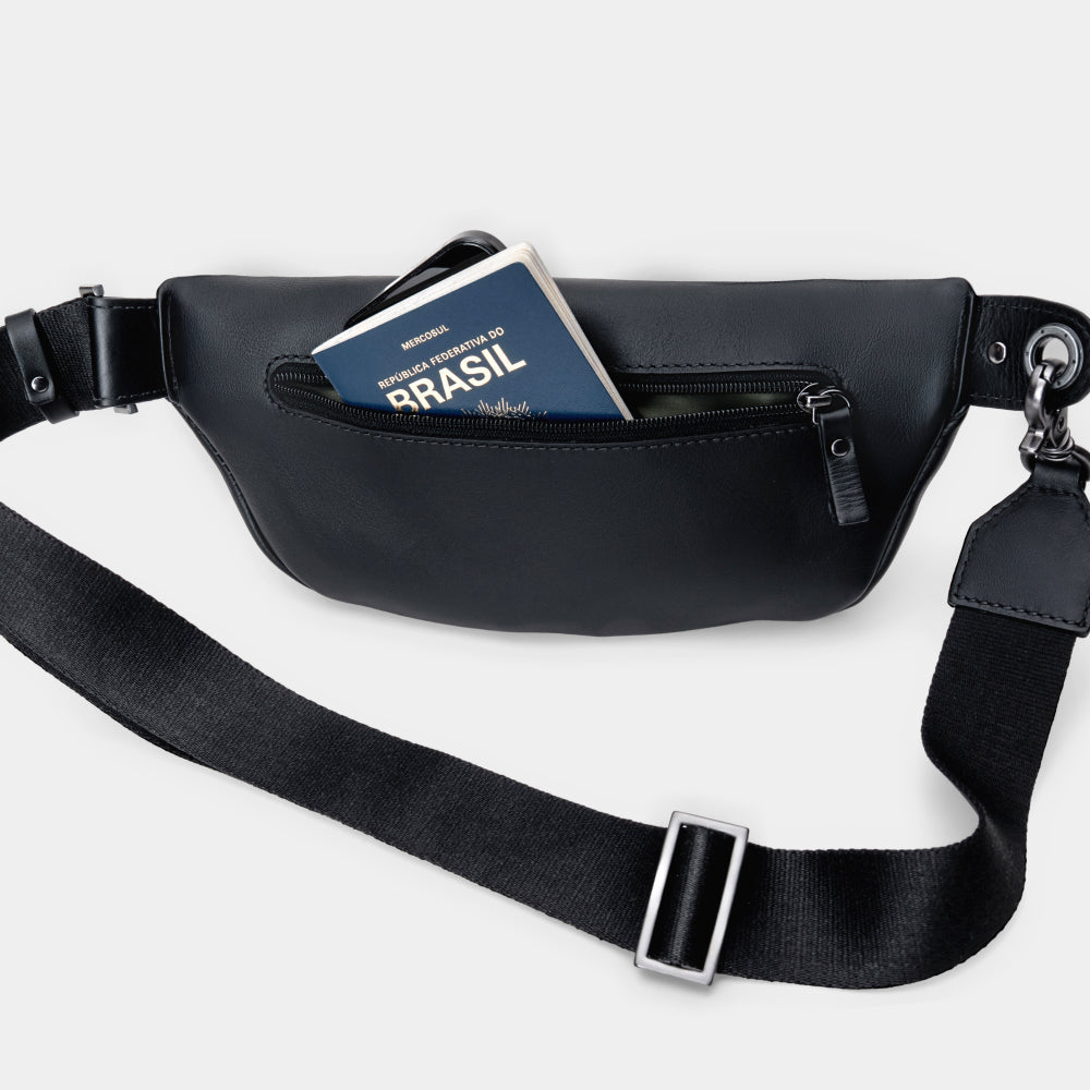 Pulse Leather Sling Bag in Black, rear pocket in use