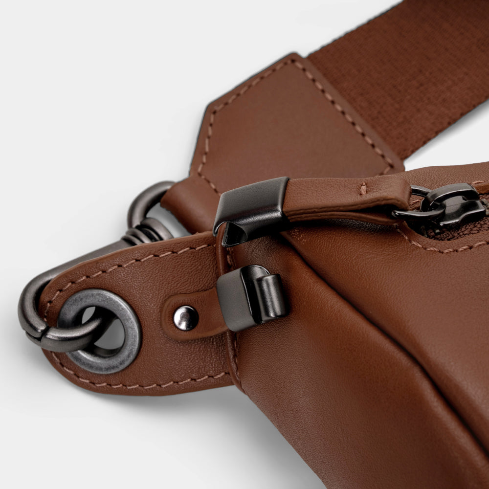 Pulse Leather Sling Bag in Caramel, zipper lock detail