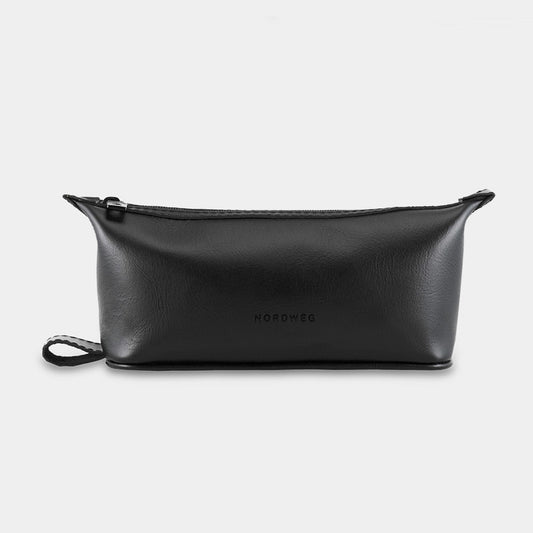 Nordweg Nomad leather dopp kit travel toiletry bag in black, front view with side loop
